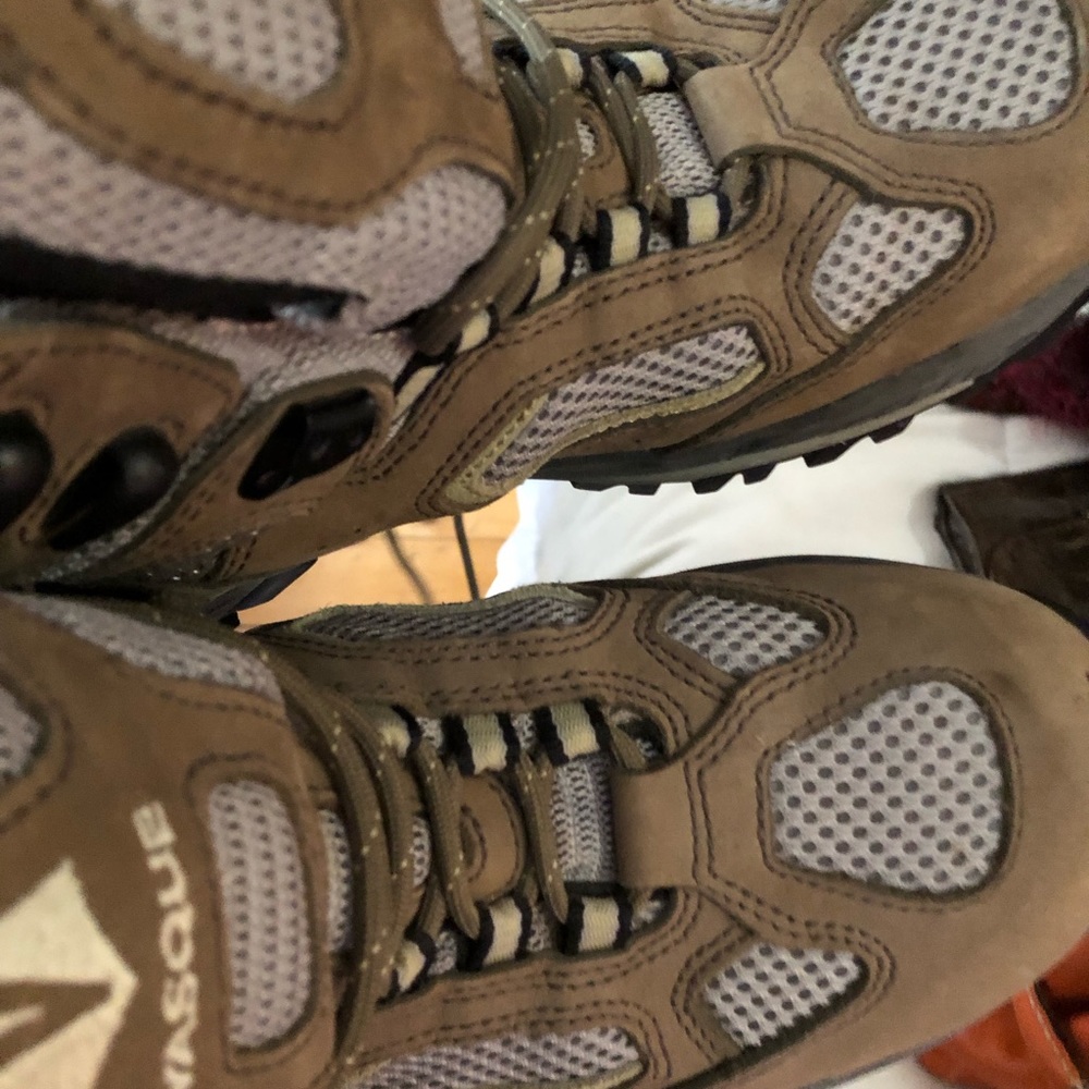 Vasque.  Short hiking boots that are amazing.
